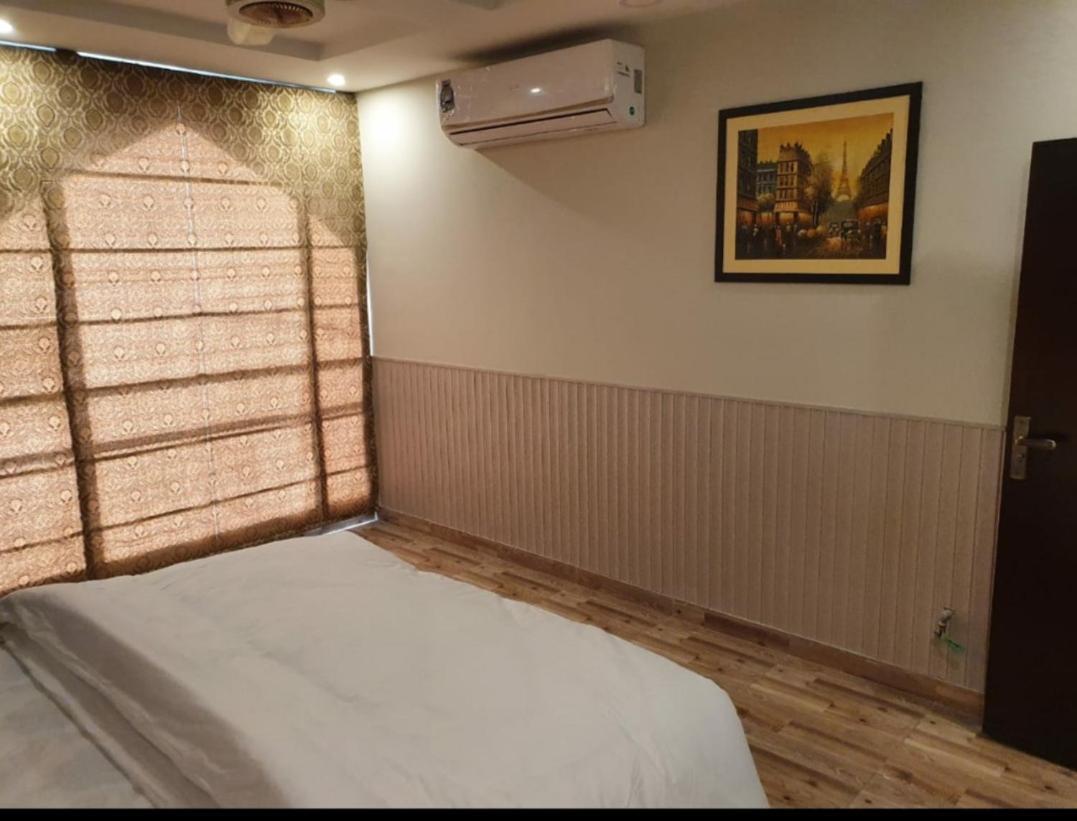 Hak Mall Suites And Apartments Rawalpindi Esterno foto